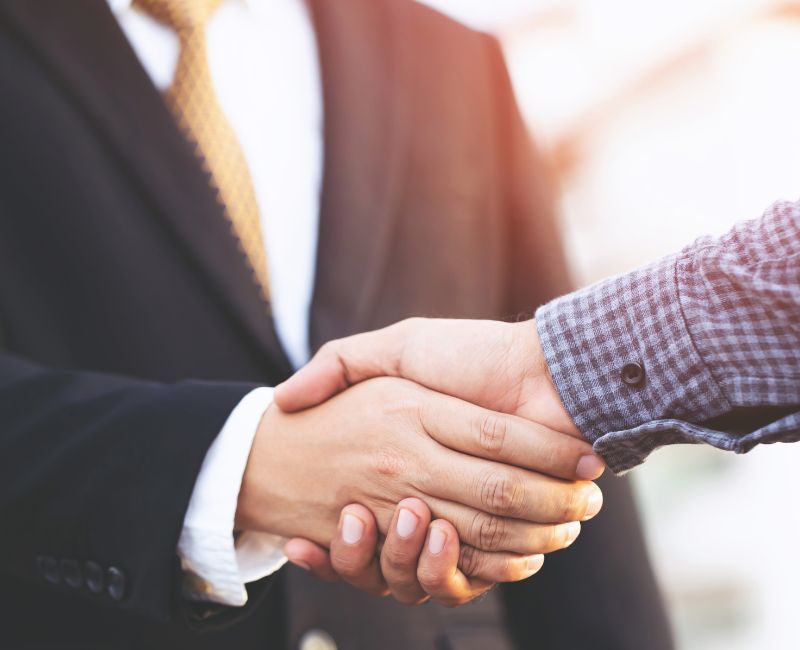 Handshake with a buyer Handshake with a buyer